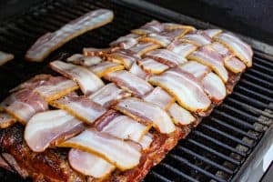 uncooked bacon weave on spare ribs