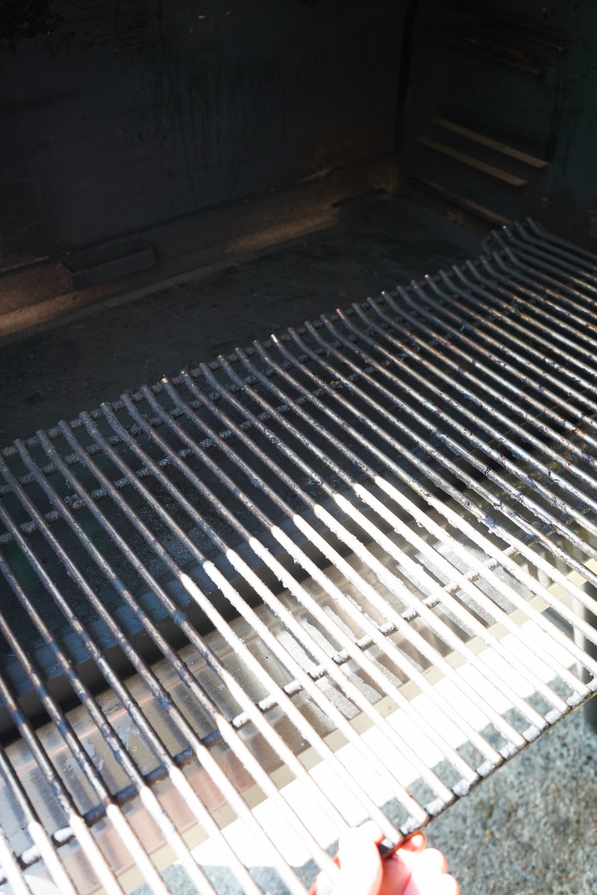 Grill Grates being removed