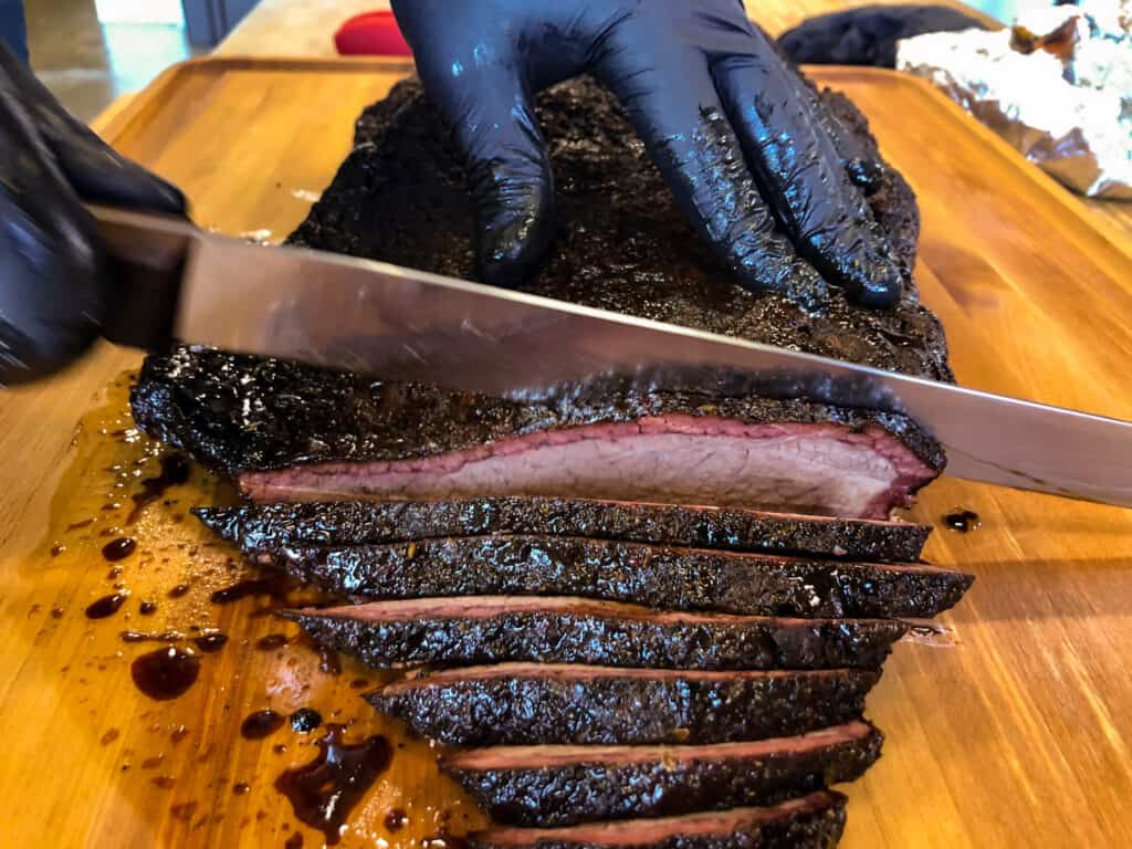 smoked brisket being sliced