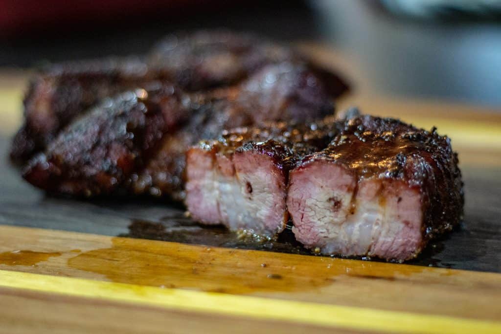 pork ribs with a good bark and a light bbq sauce glaze