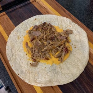 tortilla, queso, and pulled pork for pulled pork crunch wrap
