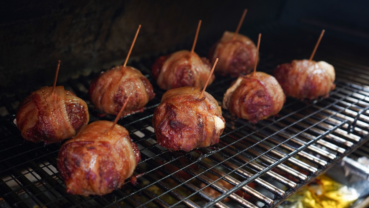 Stuffed meatballs in smoker