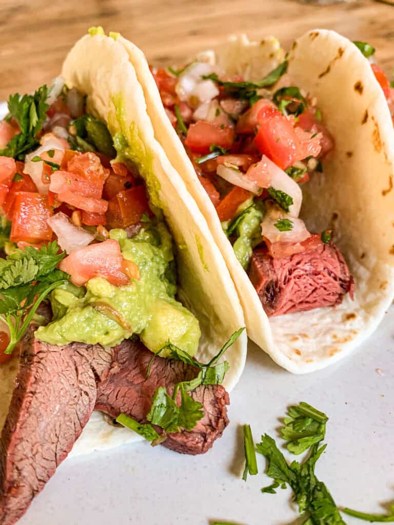 flank steak tacos with pico de gallo and guacamole