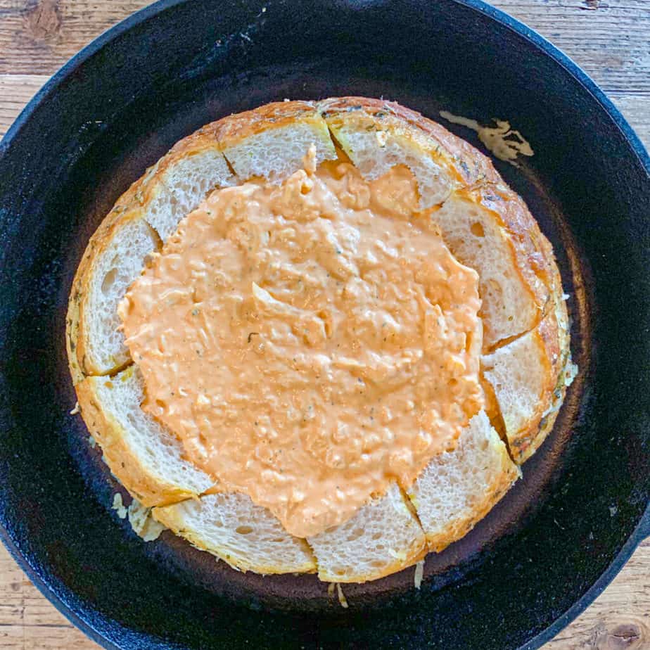 smoked buffalo chicken dip recipe in a bread bowl before it is smoked