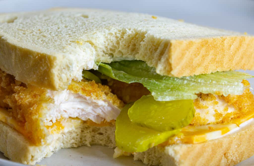 Traeger chicken tenderloins in a sandwich
