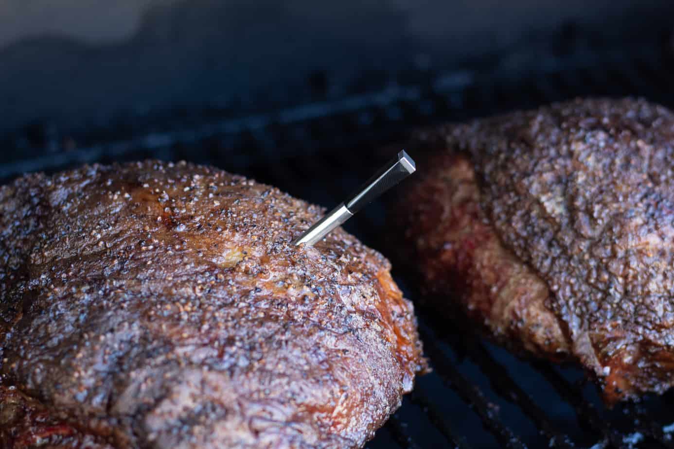 https://www.smokedmeatsunday.com/wp-content/uploads/2021/11/Yummly-Smart-Thermometer-In-Meat.jpg