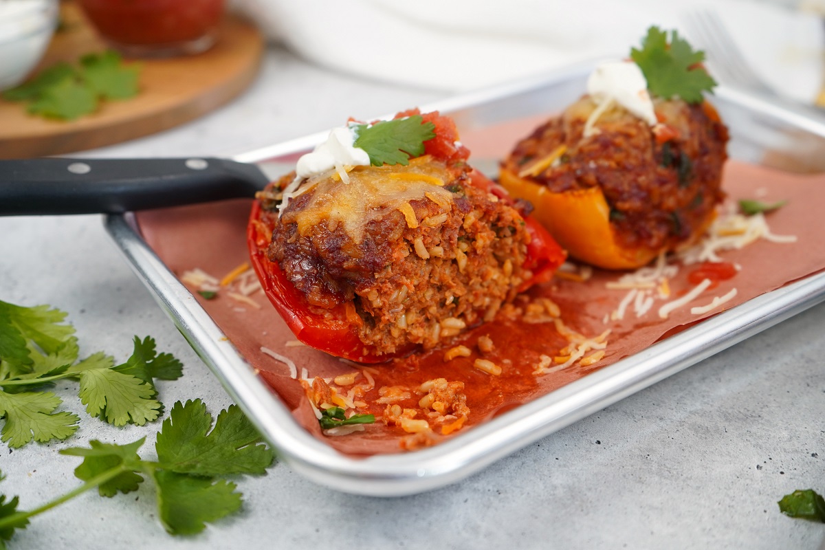 Smoked stuffed peppers with chorizo and rice cut open. 