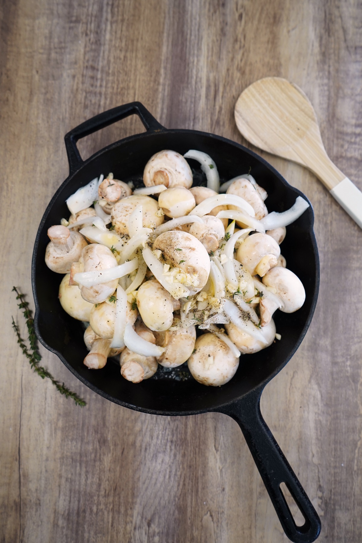In a large cast iron skillet or pan of choice combine all of the ingredients for the smoked mushrooms. 