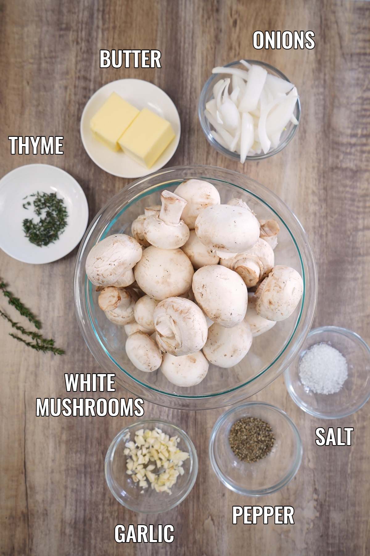 Smoked mushrooms labeled ingredients in bowls. 