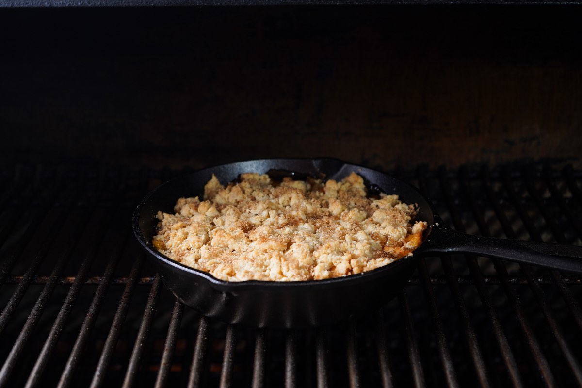 Peach cobbler in smoker